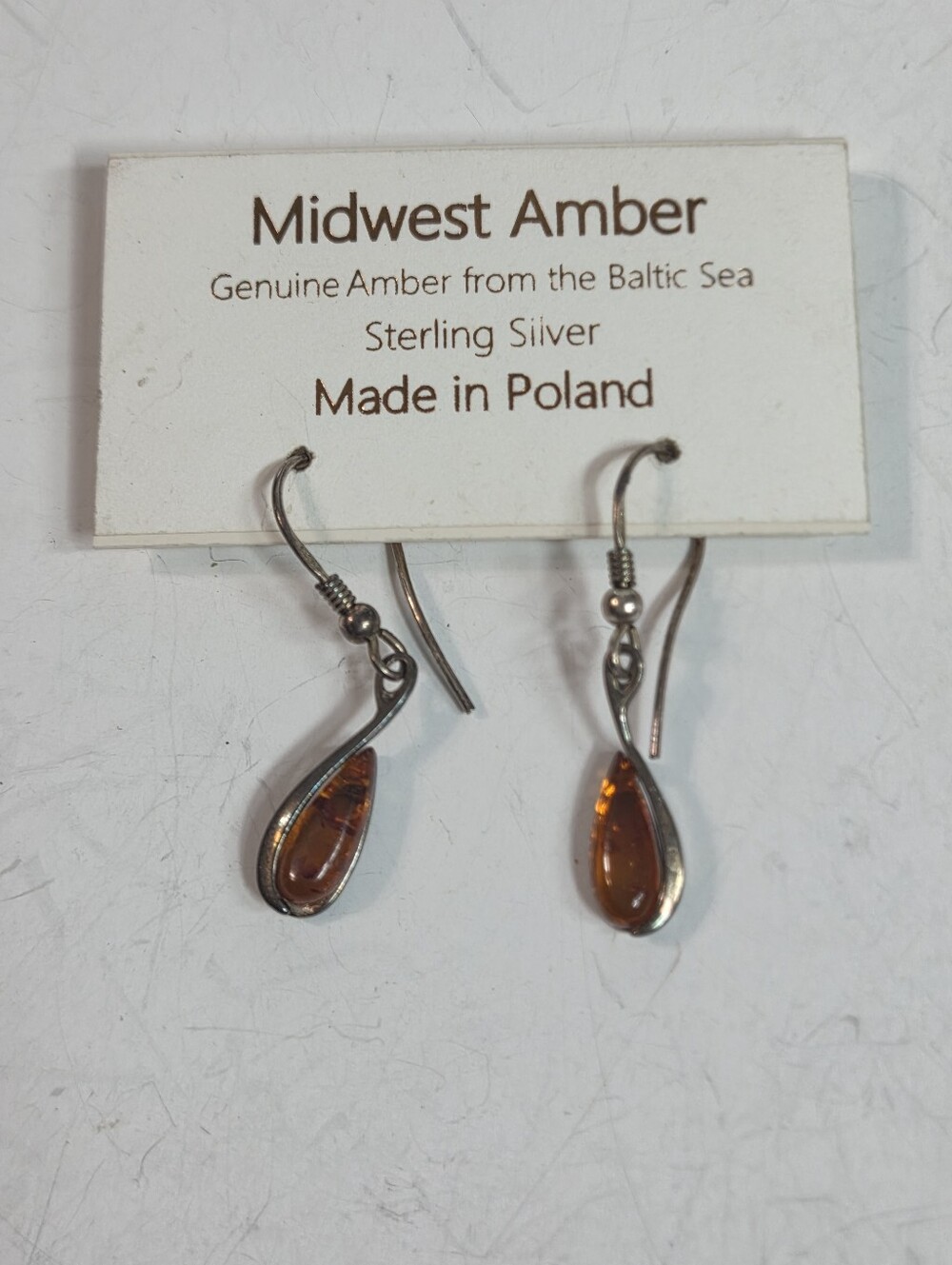 baltic amber pierced earrings made in poland sterling silver hook style earthy
